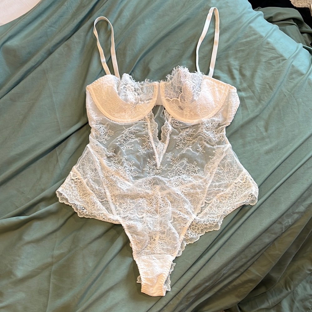 Lacy white bodysuit